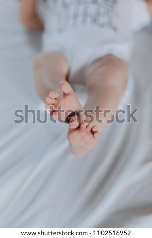 newborn feet on white background