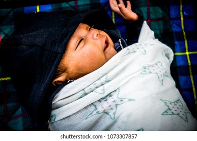 Newborn Latino Baby In Blanket