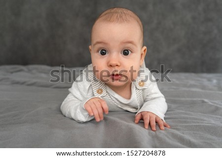 Similar – Der kleine Junge im Schlafzimmer im Bett.