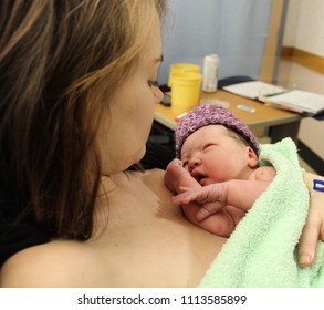 Newborn Native American Infant Baby Childbirth in Hospital and Young Mom
