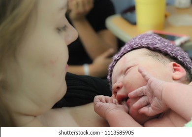 Newborn Native American Infant Baby Childbirth In Hospital And Young Mom