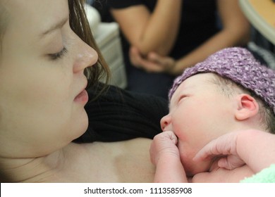 Newborn Native American Infant Baby Childbirth In Hospital And Young Mom