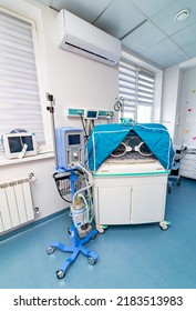 Newborn Patient Beds In A Maternity Ward. Modern Hospital Baby Health Care.