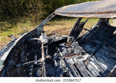 Newburn UK: 29th April 2022: A Stolen Car Which Has Been Burnt Out And Dumped In A Field. Small Car Fire Interior