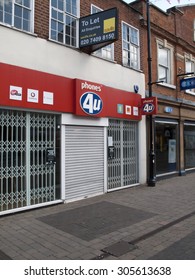 Newbury, Northbrook Street, Berkshire, England - August 07, 2015: Phones 4U vacant premises due to the company going into administration September 2014
