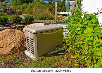 Newbury, USA - September 29, 2022: Residential Standby Generator On Concrete Pad