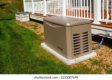 Newbury, USA - September 29, 2022: Residential Standby Generator On Concrete Pad