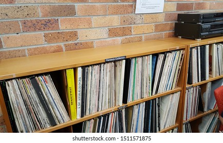Newcastle, Australia - May 2019: A selective focus view of vinyl record collection on the rack in the library of University of Newcastle, Callaghan campus.
