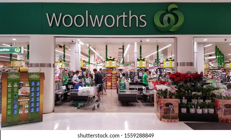 Newcastle, Australia - Oct 2019: Front Shop View Of Woolworths Supermarkets, Signboard, Cashier's Desk, Shopper Paying Queue. This Is A Popular Australian Supermarket/grocery Store. Christmas Mood