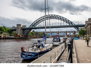 Newcastle, England. 05/06/19. View of the Tyne Bridge from the Quayside in Newcastle upon Tyne on a Overcast Day