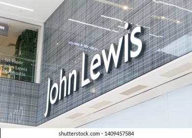 Newcastle / England - Mar 18, 2019 : John Lewis sign, signage, logo and branding on wall inside shopping mall.
