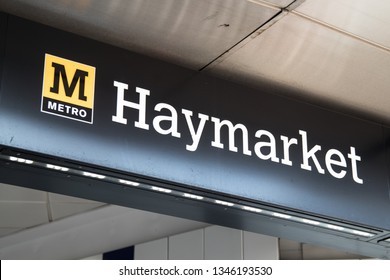 Newcastle / Great Britain - February 27, 2019: Exterior Of Entrance To Haymarket Metro Light Rail Station Showing Station Sign And Metro Logo And Branding.  Underground Station