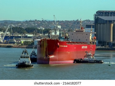 NEWCASTLE, NSW, AUSTRALIA-JULY 26, 2007: The Pasha Bulker Coal Ship Which Ran Aground On Nobby's Beach, Newcastle During A Huge Storm Leaves The Harbour After Repairs For Japan.