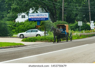 Newcastle, Pennsylvania / US - 07/17/2019 : A Closer Look On The Amish Community Blending In The Newcastle Town Scenery 