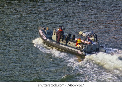 Newcastle, United Kingdom - October 5th, 2014 - UK Border Force RIB Patrol Boat With Crew Member