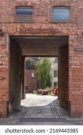 Newcastle Upon Tyne, UK: June 15th, 2022: Looking Through The Entrance To Live Garden - An Outdoor Café Bar Space At Live Theatre.