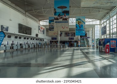 Newcastle Upon Tyne, UK - March 22, 2021.
Inside The Newcastle International Airport, UK. The Empty Main Terminal 1 With The Check-in Desks During The Covid Pandemic Time. 