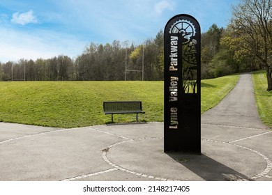  Newcastle-under-Lyme, Staffordshire-united kingdom April, 11, 2022 public benches at Lyme valley parkway in the springtime sun
