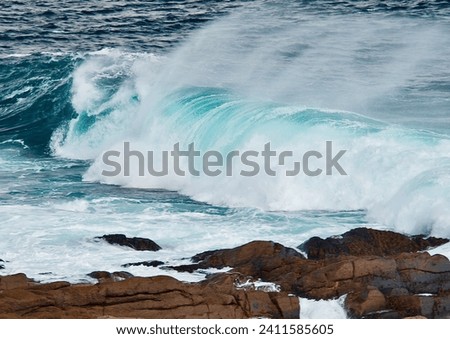 newfoundland Cape Spear Huge Waves breaking on Rocks with water spray