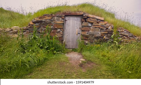 Newfoundland root cellar with rocks