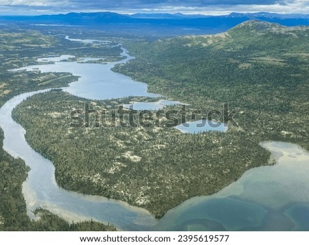 The Newhalen River in the Lake and Peninsula Borough of Alaska. Beginning at Six Mile Lake, the Newhalen flows south to enter Iliamna Lake. Major pathway for sockeye salmon migration.