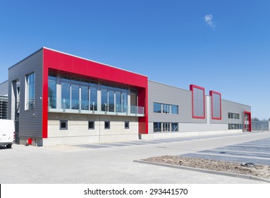 newly build modern red office building with warehouse 
