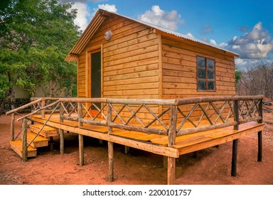 Newly Build Wood Cabin On Poles, With A Large Porch Veranda