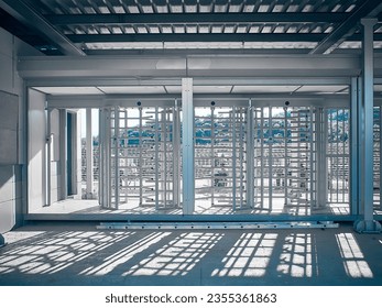 Newly built access control security gate. Prefabricated security turnstile at construction site. Protected entrance gate