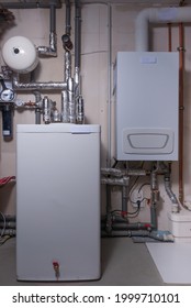 Newly Built Heating System With Thermal Storage Tank And Expansion Tank. Installed In The Basement Of A Family House