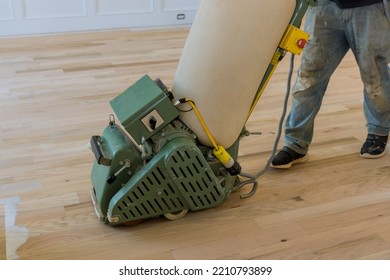 In Newly Built House, It Is Necessary To Grind The Wooden Parquet Floor Using Floor Sander Order To Smooth It Out