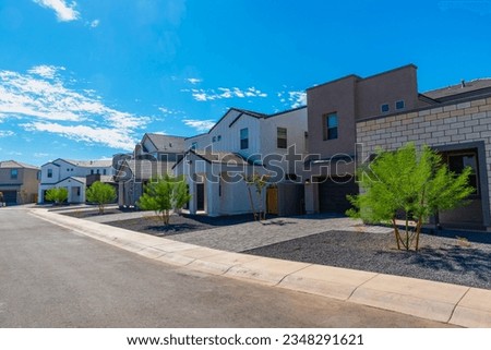 Newly built single family homes in Arizona await buyers.