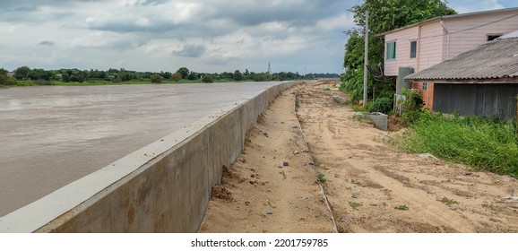 Newly Built Strong Cement Walls, To Prevent Water From Dams Flooding Houses, In Rural Areas Of Thailand.