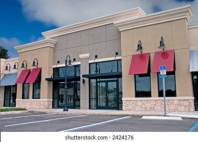 Newly Constructed Commercial Mall With Stone Accents On Front Faces