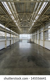 Newly Constructed Empty Warehouse/factory From Above During The Day, Filled With Natural Light.