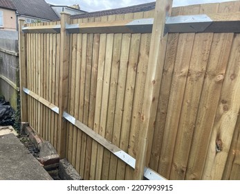 Newly Constructed Fencing Panels With Feather Edge Planks