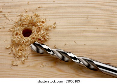 Newly drilled hole with saw dust