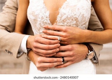 Newly Married Couple Wedding Rings - Powered by Shutterstock