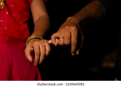 Newly Married Male And Female Hands Holding Fingers With Male Hand Leading Way