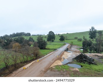 Newly opened bridge construction over small river in regional Australia.