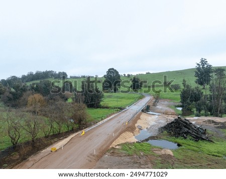 Newly opened bridge construction over small river in regional Australia.