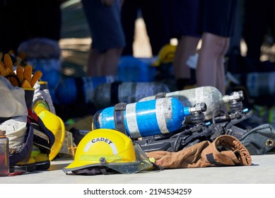 Newly Recruited Cadet Fire Firefighters In Training With Equipment