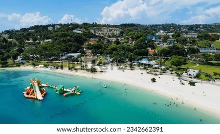 The newly-opened Harmony Beach Park with its white sand beach and turquoise blue water. A now popular recreation destination for families in and around the Montego Bay Area. 