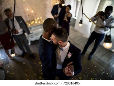 Newlywed Gay Couple Dancing On Wedding Celebration