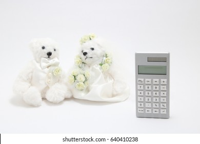 Newlyweds And Calculator On White Background.
Wedding Budget Concepts. 