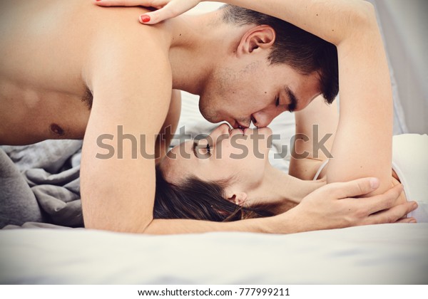 Newlyweds Gently Kissing Bed Early Morning Stock Photo Edit Now