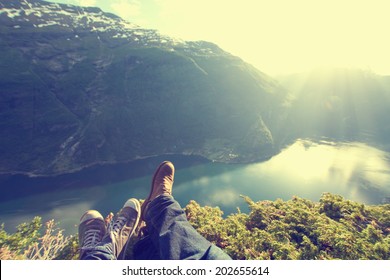 Newlyweds Honeymoon Vacation In Norway. Photo In The Mountains Near The Lake. Instagram. 