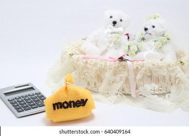 Newlyweds, Money And Calculator On White Background.
Wedding Budget Concepts. 