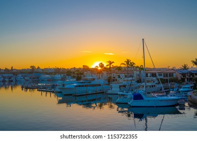 Newport Beach, CA / USA - July 21, 2018: Boat Harbor Vessels Near Balboa Island As Rises In The East