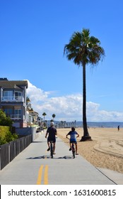 Newport Beach, USA 10-04-2018 People Cycling At The Beach Road, California