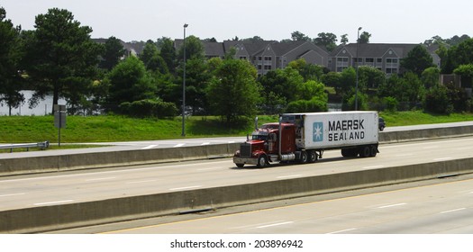 NEWPORT NEWS, VIRGINIA - JULY 3, 2014:A Maersk Container On I-64 West In Newport News VA Maersk A Danish Business Conglomerate,  Largest Container Ship Operator And Supply Vessel Operator Since 1996.